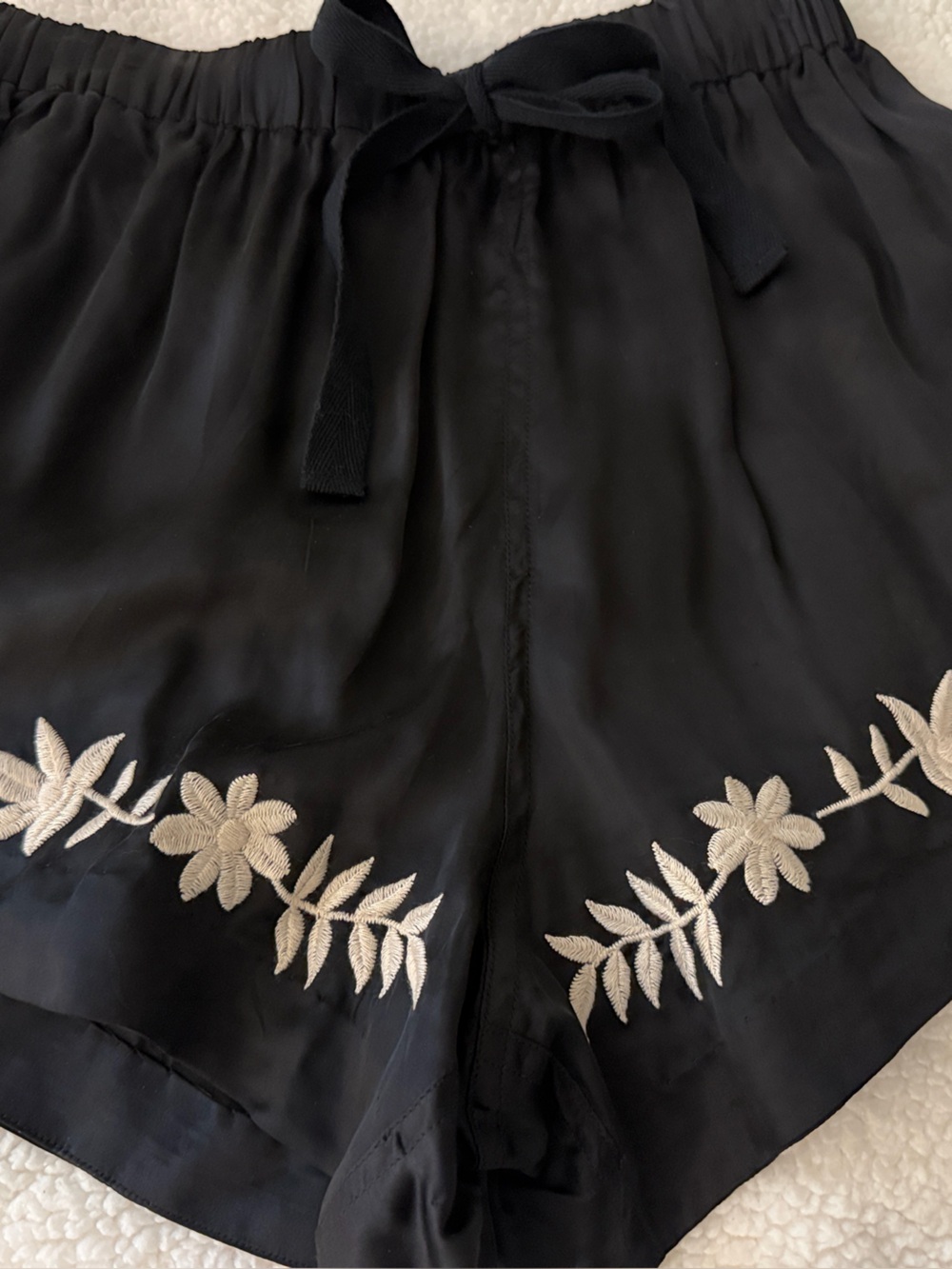 THE GREAT. Black High-Waist Shorts with Cream Floral Embroidery